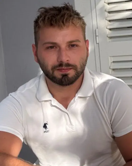 Bruno Molan in a white polo